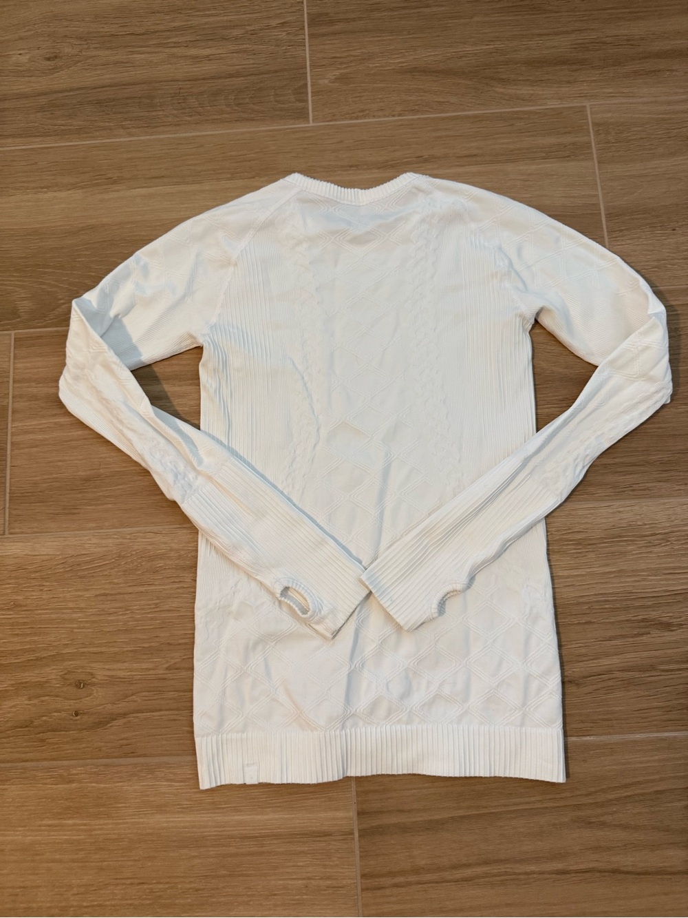 Lululemon Rest Less Pullover in Heathered White.